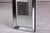 This vintage Italian wall mirror dates from the 1980s and features a simple yet elegant combination of glass and wood. Its...