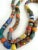 Vintage handmade African trade beads strung on raffia. A nice addition to layer or drape over home decor elements. These...