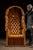 Oversized high-back Porter's Chair upholstered in rich brown leather, featuring deep diamond tufting across the back,...