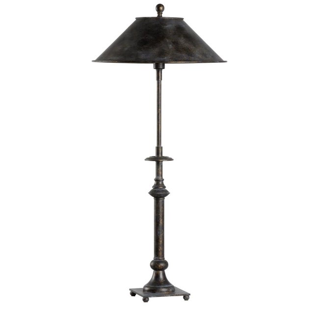 Designed by claire bryson, the sebastian lamp will shine in any setting. The juxtaposition of the classic candlestick...