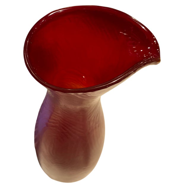 This beautifully textured glass carafe is unmarked but is a striking example of the Battuto technique - developed in...