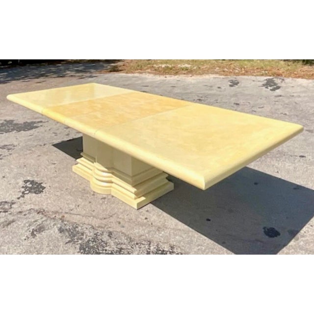 A spectacular vintage Regency dining table. Chic hand placed tessellated bone tile on a infinity edge top. Stacked column...