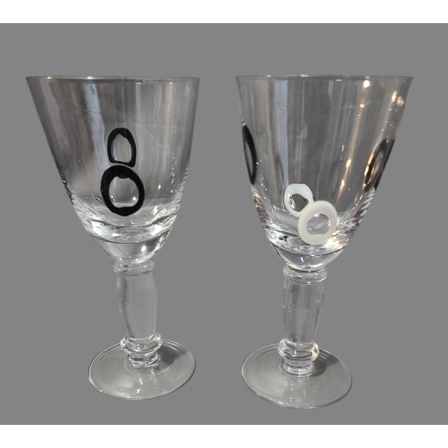 Discover a touch of sophistication with this pair of Mid-Century Modern goblets, adorned with an elegant fusion of black...