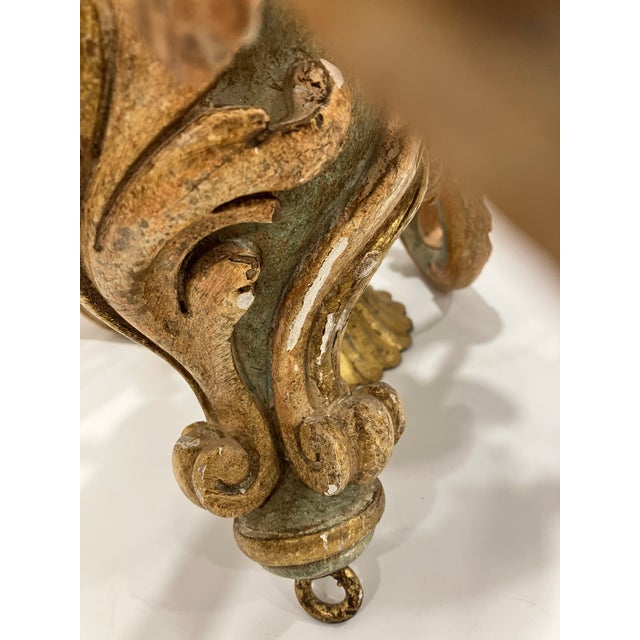 This hand carved painted wooden chandelier was probably made in Florence Masterly painted like only Italian craftsmen can...