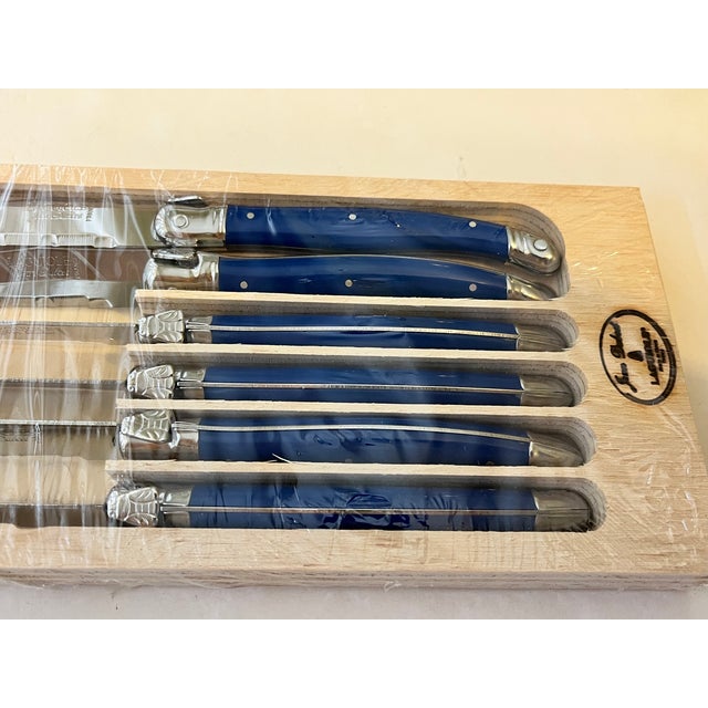 Brand new set of 6 French Laguiole steak knives designed by Jean Dubost with its "Authenticity Certificate". These knives...