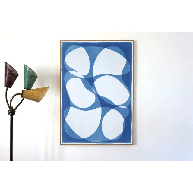 This is an exclusive handprinted unique cyanotype that takes its inspiration from the mid-century modern shapes. It's made...