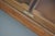 This oak haberdashery shop counter dates from the 1920/30s and was made in England. It features a solid wooden frame with...