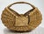 Extra large vintage primitive Farmhouse style "Buttocks Basket" with a woven handle and "Gods Eye" woven detailing on both...