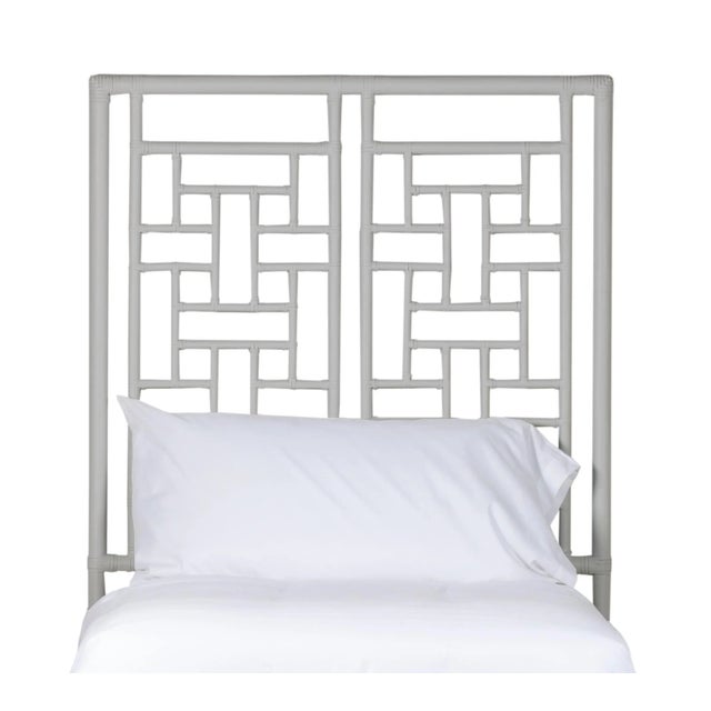 This headboard features classic Rattan design in a geometric pattern. Constructed of solid rattan and hand bound with...