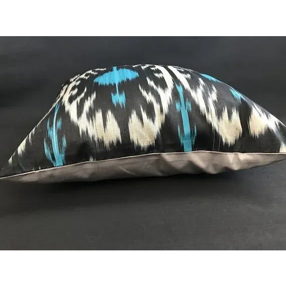 Ikat pillow backed with coordinating cotton fabric. Does not include pillow insert. Excellent condition