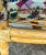 1970s McGuire Bamboo and Rattan Flip-Top Games Table With Extension Leaves and Four Dining Chairs For Sale - Image 9 of 12