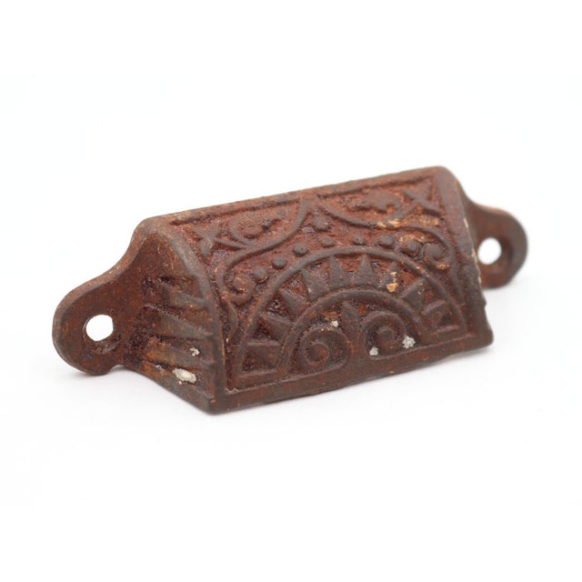 Aesthetic style bin drawer pulls made of cast iron with a black finish. The original mounting screws are not available....