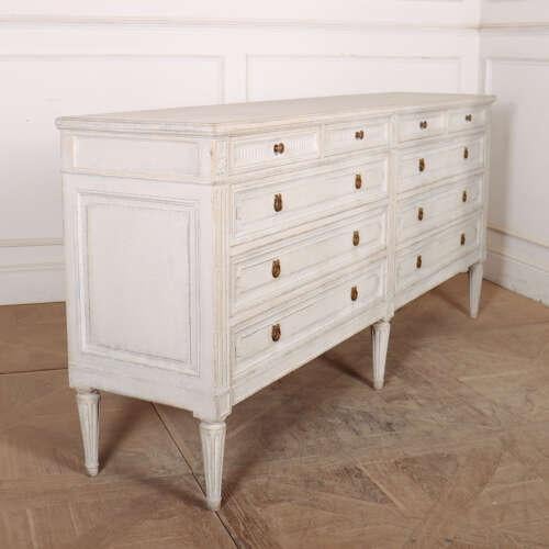 Early 20th Century French painted double chest of drawers. 1920 This piece is designed in the style of the selected...