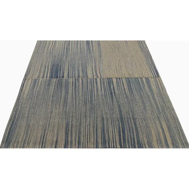 This remarkable contemporary Scandinavian Style Kilim area rug features a dramatic pop of electrifying colors in a...