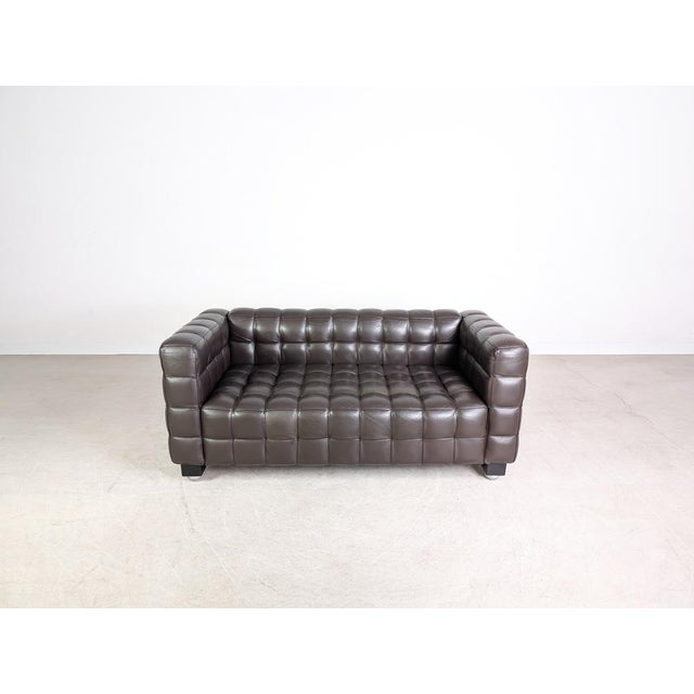 Beautiful Wittmann Kubus sofa, a two-seater in brown leather, for sale. Designed by Josef Hoffmann, it is now considered a...