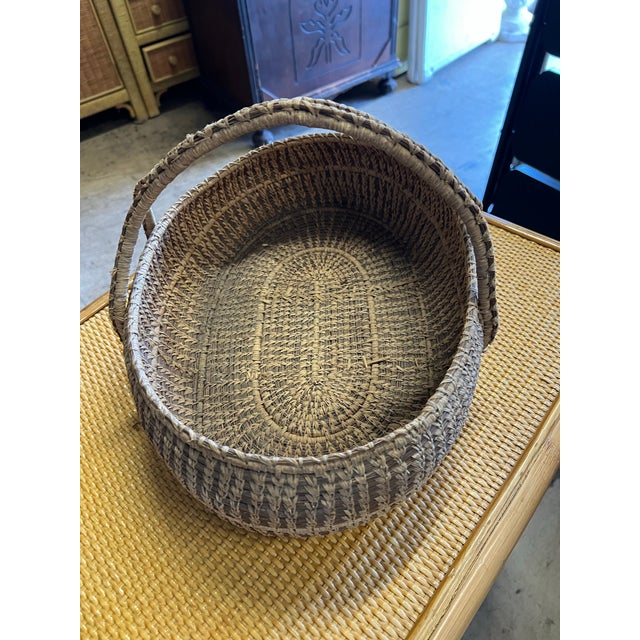 Vintage Handwoven African / Moroccan Style Oval Raffia Basket With Center Cross Handle For Sale - Image 4 of 8