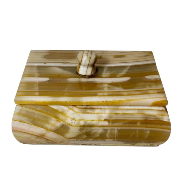 A striking mid century agate and marble box in warm earth tones, dating to the 1970s. The box features beautifully veined...