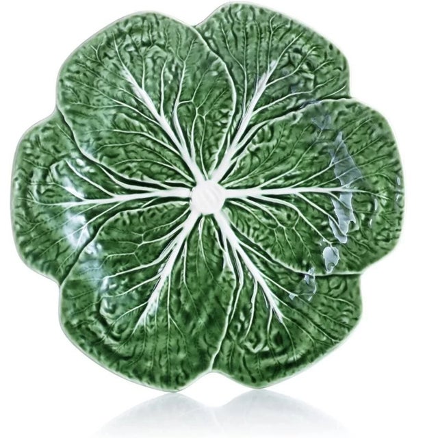 Bring timeless charm and artistry to your table with this beautiful set of Bordallo Pinheiro cabbage leaf dinner plates....