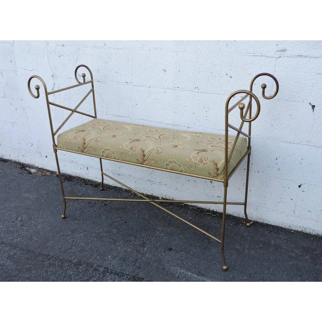 This beautiful bench/stool is made out of metal and upholstery, it has a gold-finish, and it is in good original...