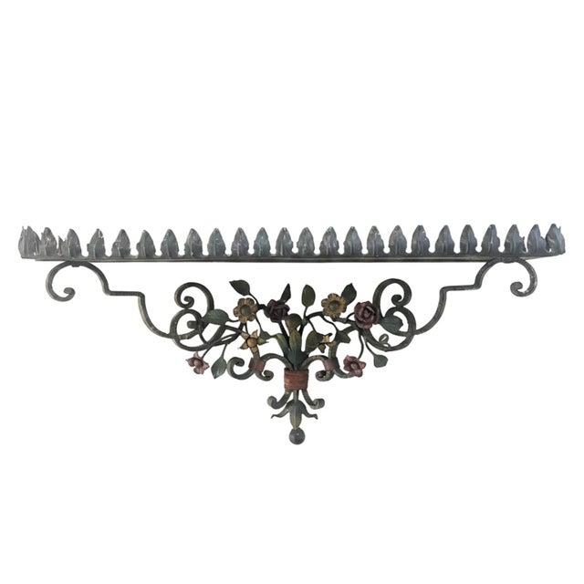 A pair of rectangular wrought iron shelves with polychrome lacquer, dating back to the early 1900s. They consist of a...