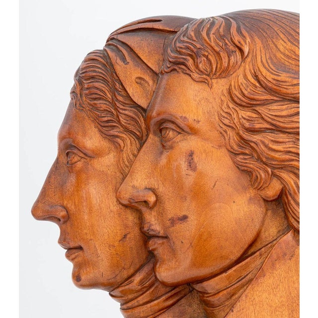 English Walnut Carved Double Relief Portrait Wall Plaque, depicting George IV and Queen Caroline busts, surrounded by high...