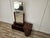 An elegant original Art Deco dressing table from the 1940s, crafted from fine walnut burl with a beautiful flamed grain...
