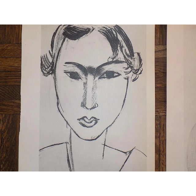 This pair of mid 20th century lithographs (offset) depict two of Henri Matisse's (France 1869-1954) iconic portraits of...