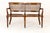A late 19th century english oak double chair-back settee. of unusual double chair-back form, the settee/bench has two...