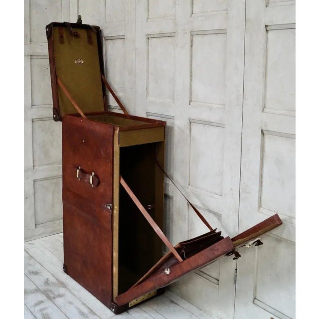 A Superb “Elgin Leather Works” Bombay Travel Wardrobe. Made from leather with brass fittings this is a unique piece of...
