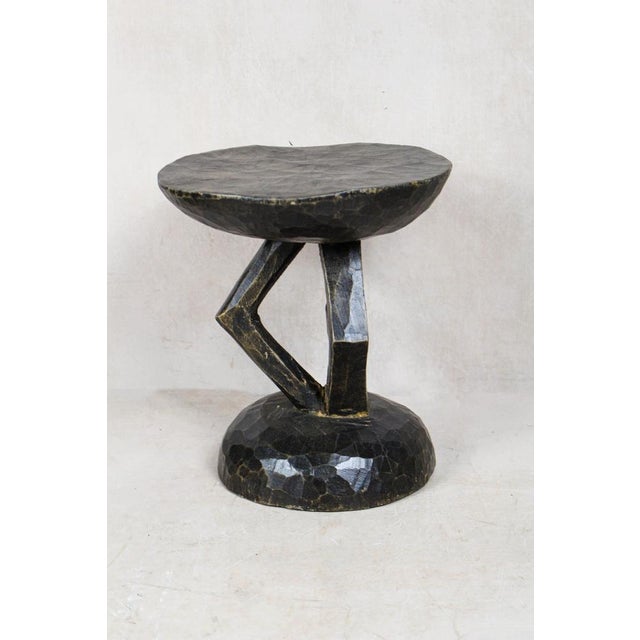 Hand-carved from a single piece of wood, the Tonga stool is a genuine artifact. These stools were status symbols for...