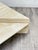 Beautiful two level triangular travertine coffee table in good vintage condition.