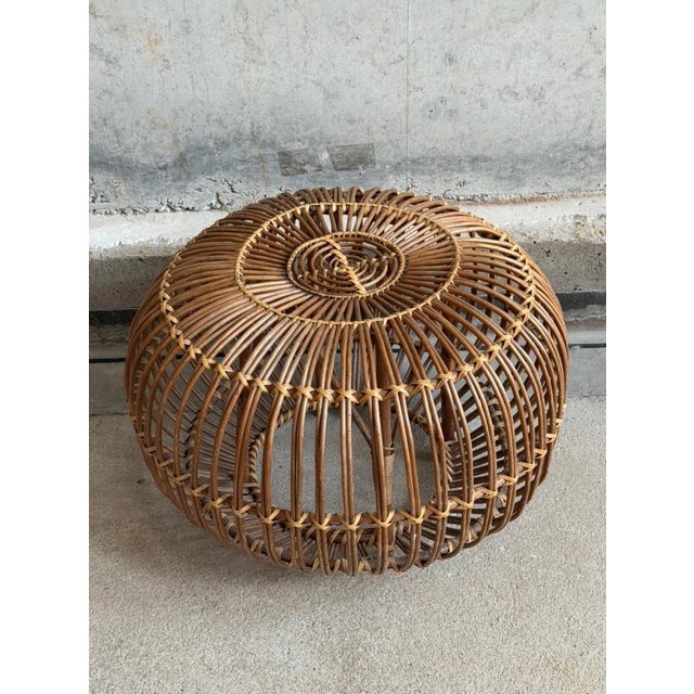 Italian wicker Lobster Pot ottoman/stool/poof designed by Franco Albini in the 60's. The ottoman is in a good vintage...