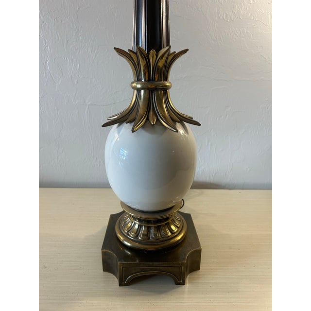 Hollywood Regency brass and ceramic table lamp made by the Stiffel lamp company. Made in the 1960’s by an American...