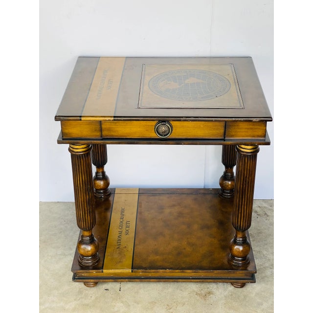 Vintage National Geographic Maitland Smith library table. On 4 pillar feet with one drawer.