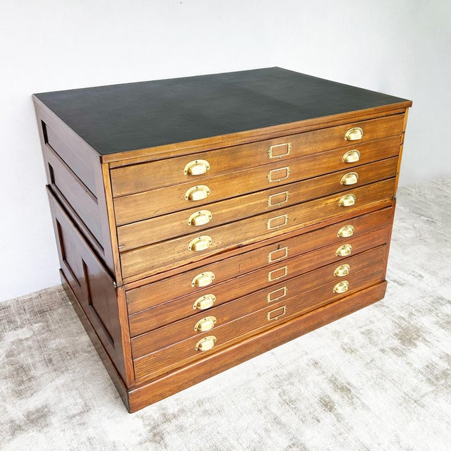 Eight-drawer plan chest constructed in two stackable sections. Each drawer designed for flat storage of large format...
