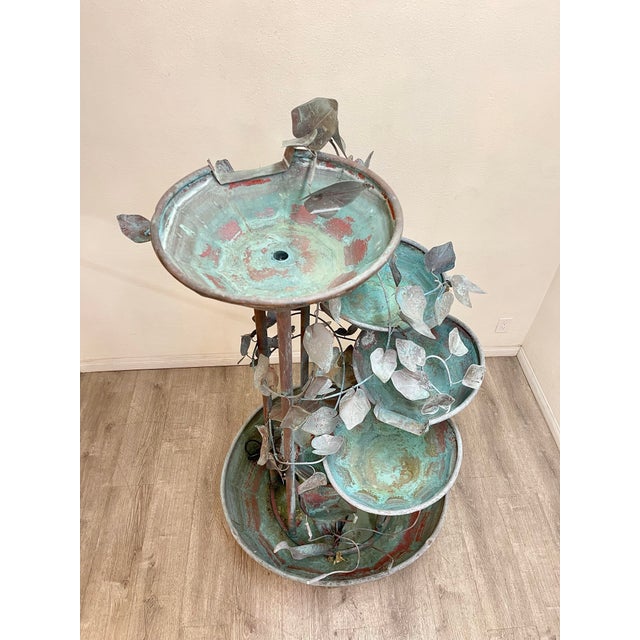 Stunning life size fountain made out of copper in good vintage condition, pump included.