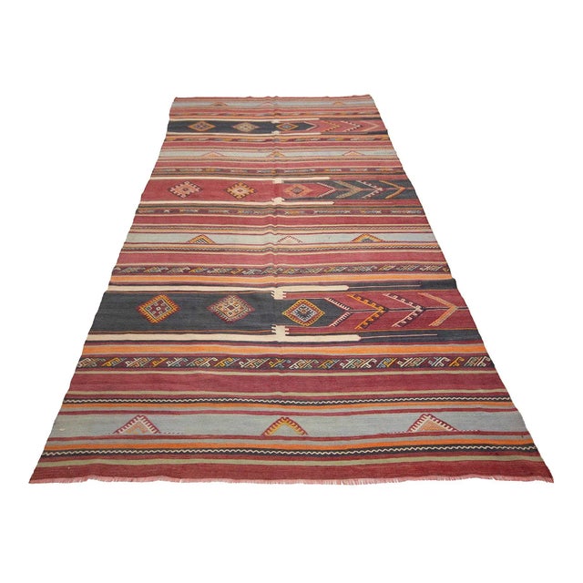 Handwoven vintage kilim rug from Denizli region of Turkey. Approximately 60-70 years old. In very good condition.