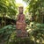 Substantial vintage Asian devotional sculpture depicting a crowned Bodhisattva seated in a contemplative pose upon an...