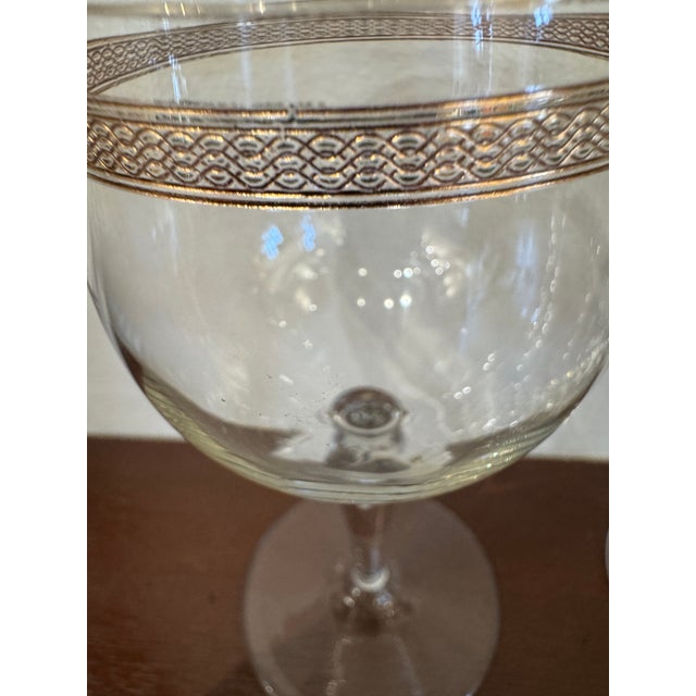 Lovely vintage Italian aperitivo glasses with gold rims and trim. Set of 7.