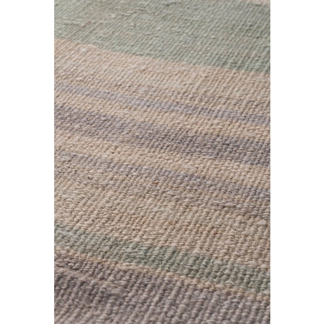 This vintage Turkish flat weave Kilim is hand-woven. The simplicity and boldness of this piece can also give a...