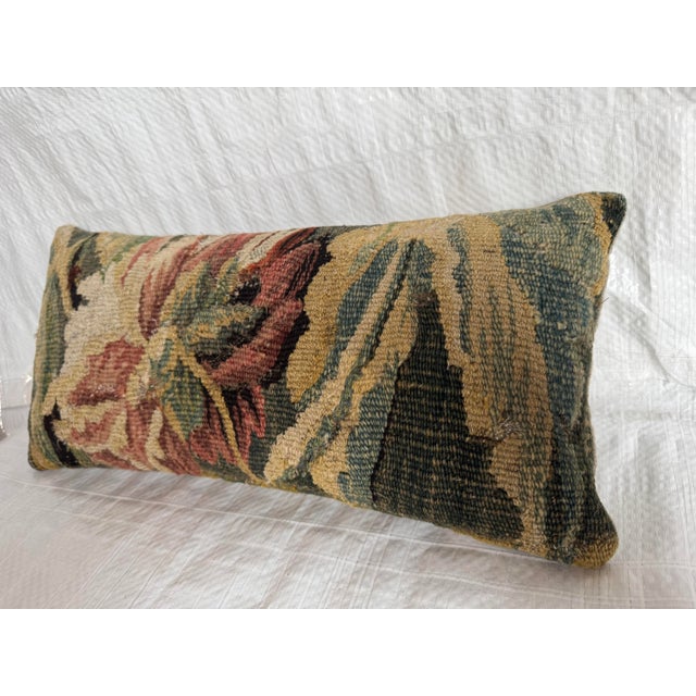 This exceptional 17th century Flemish tapestry pillow is created from an authentic verdure tapestry fragment woven in...