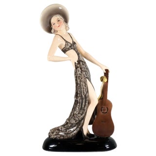 Lady with Hat and Guitar Figure attributed to Stephan Dakon for Goldscheider, Vienna, 1934 For Sale
