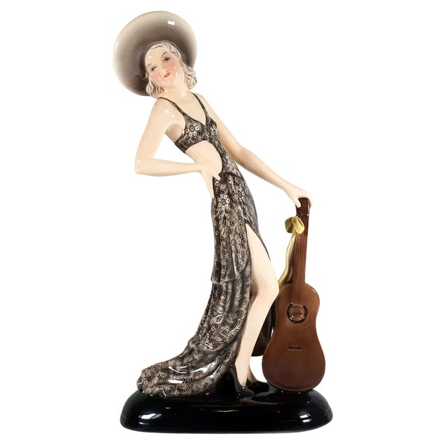 Lady with Hat and Guitar Figure attributed to Stephan Dakon for Goldscheider, Vienna, 1934 For Sale
