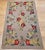 Vintage American hand hooked area rug in a fruit pattern circa the early 20th century. The very unique and beautiful...