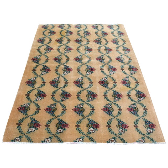 Vintage Turkish Anatolian hand knotted wool rug with natural colors.
