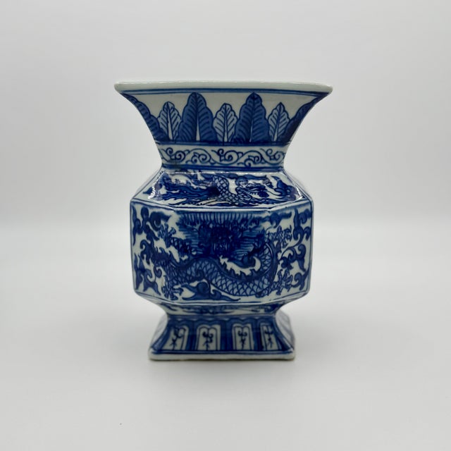 Description This is a striking Chinese blue and white porcelain vase, beautifully crafted in the rare form of an octagonal...