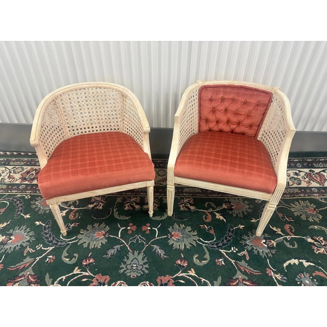 Elevate your space with this chic set of two vintage cane barrel back tub chairs, seamlessly blending nostalgia with...