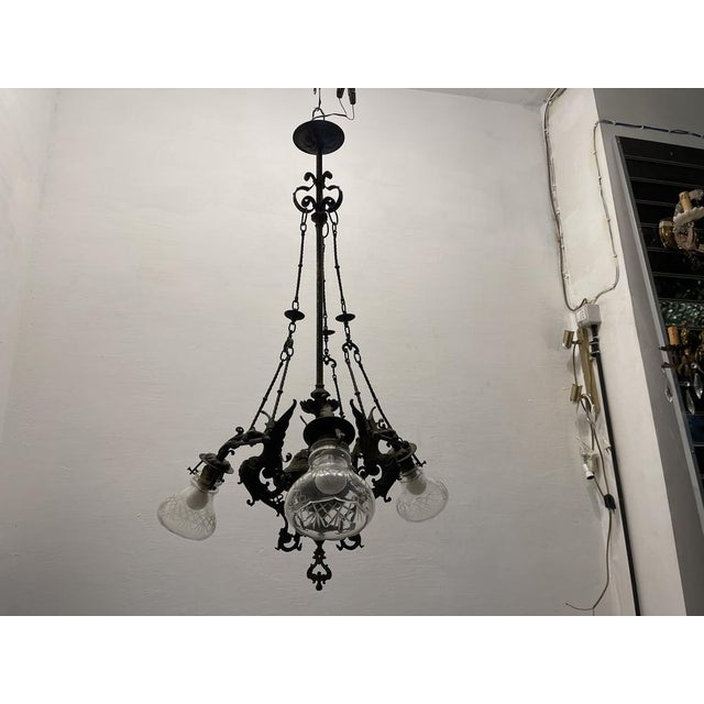 Vintage Bronze Chandelier, 1940s, in Good conditions. Designed 1920 to 1949 Up to 250V (Europe/UK Standard).The wiring of...