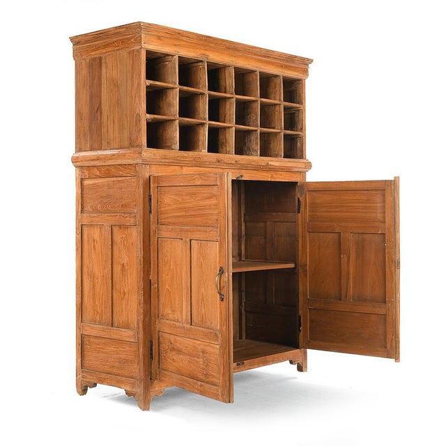 Wooden hotel furniture with 18 lockers and a cupboard. Vintage teak furniture. Has 18 storage lockers and 2 wooden...