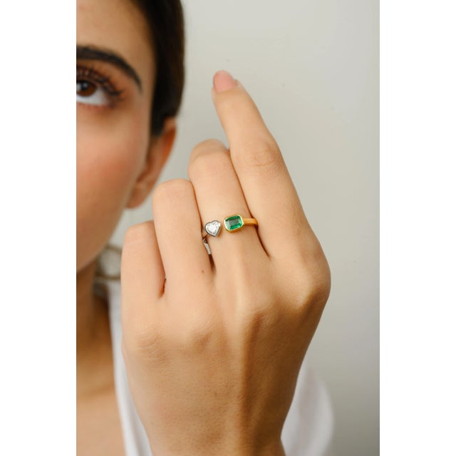 This is part of Chairish’s Fine Jewelry assortment. Diamond Heart and Emerald Toi et Moi Two Toned Ring in 18K Gold...
